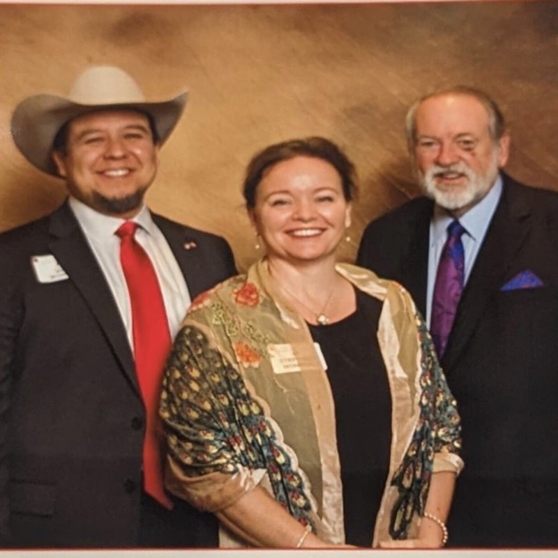 Mike and his wife meet Mike Huckabee at a local Republican event.