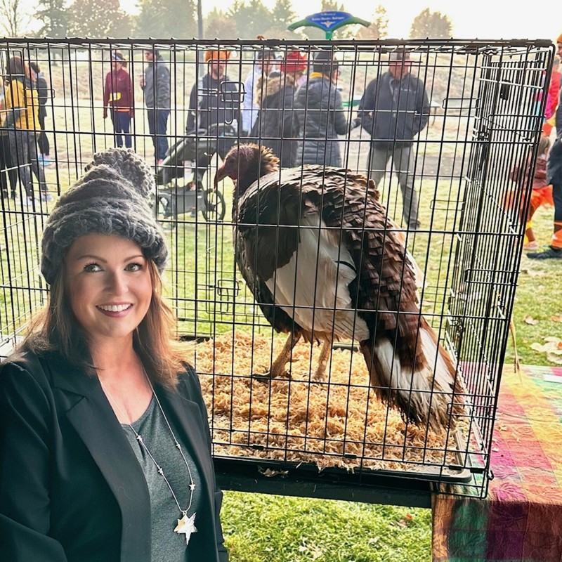 Pardoning a turkey on Thanksgiving, 2022 at Sarg Hubbard Park at the Greenway's Turkey Trot.