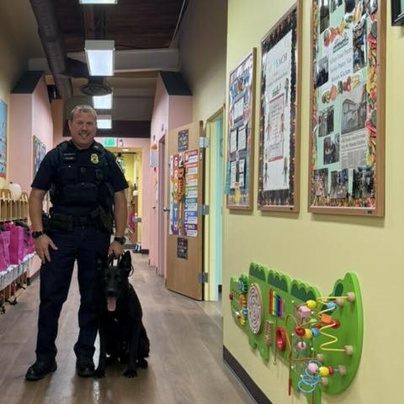 Jerame and K-9 Keno visiting at a school