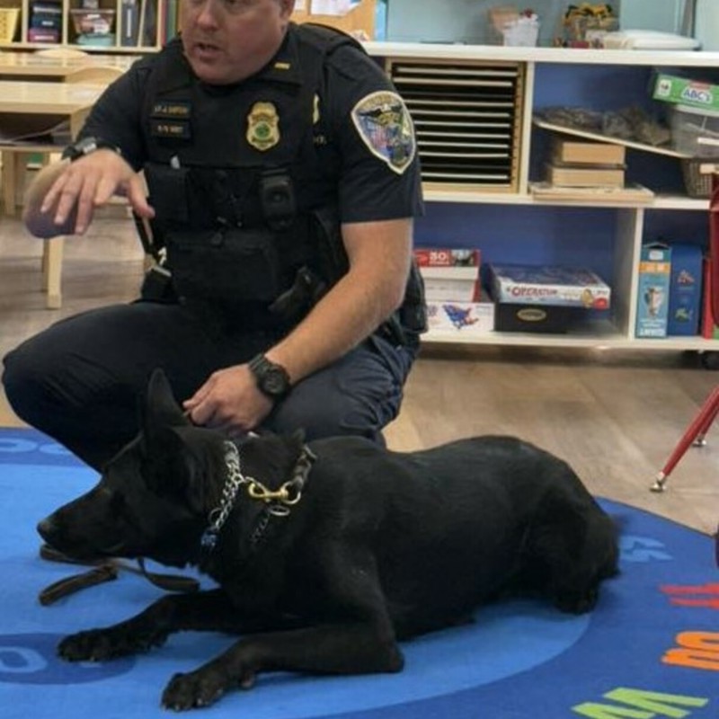Jerame and K-9 Keno visiting school children