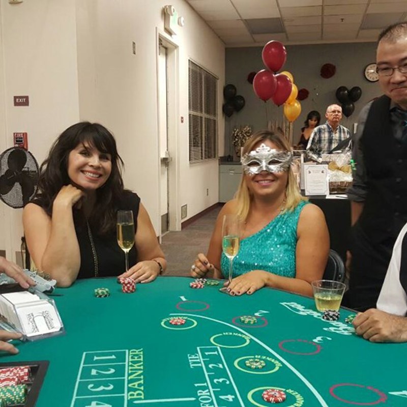 Attendees playing Baccarat