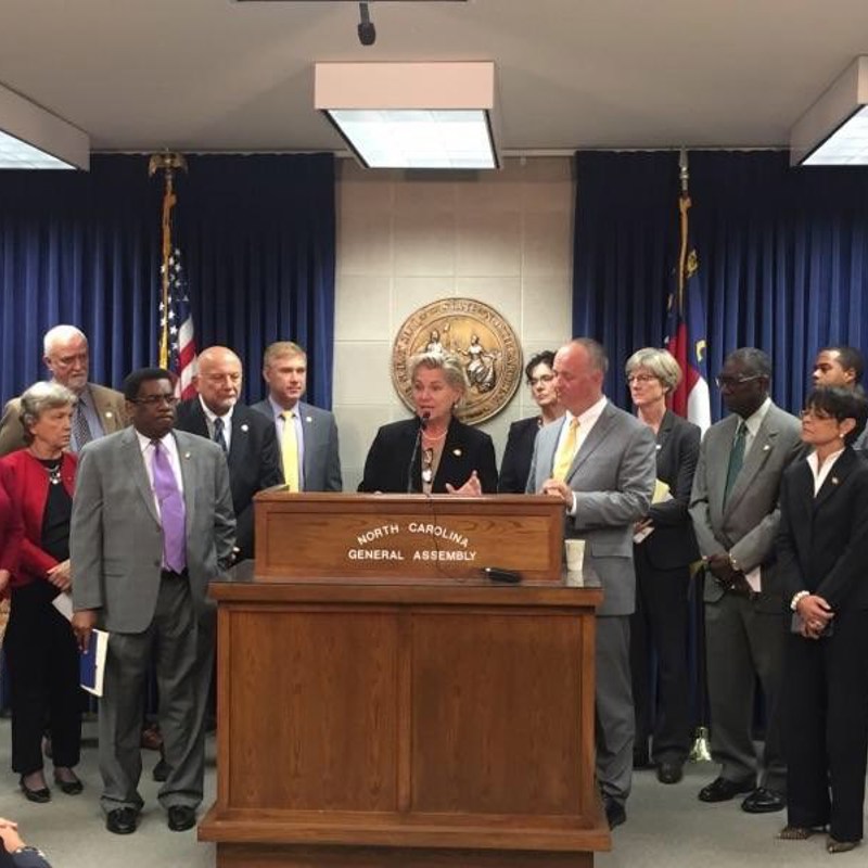 Rep. Deb speaking at House Minority Leader Darren Jackson's press conference on water quality, education, and redistricting