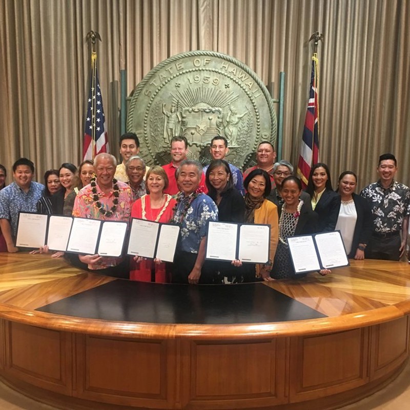 Joining fellow lawmakers and the Governor for the signing of the Kupuna bills