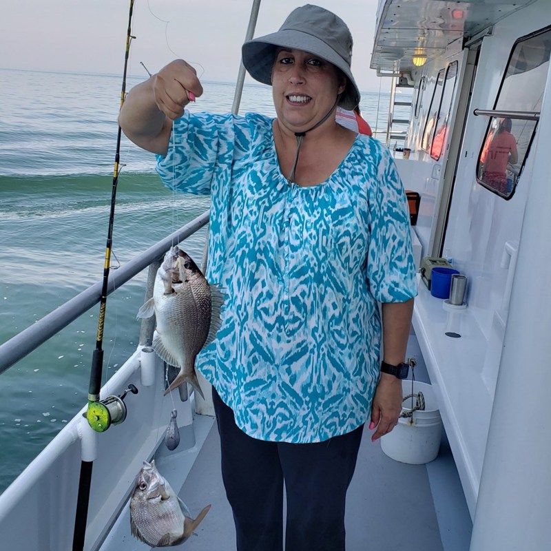Yvette fishing in Greenport, Yvette is a strong advocate for the fishing industry.