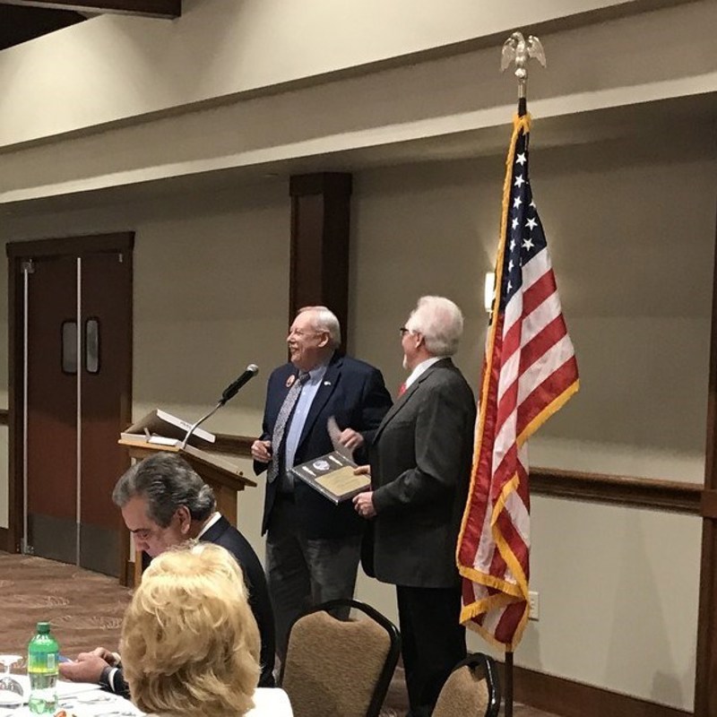 Introducing Recorder of Deeds Dennis Montross as he received the Republican Service Above Self Award at Lincoln Day event recently