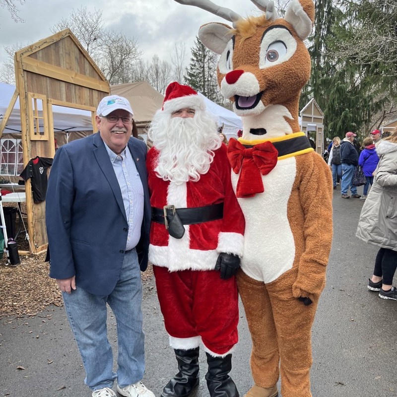 Getting endorsement from Santa and Rudolph at Factoryville Christmas marketplace